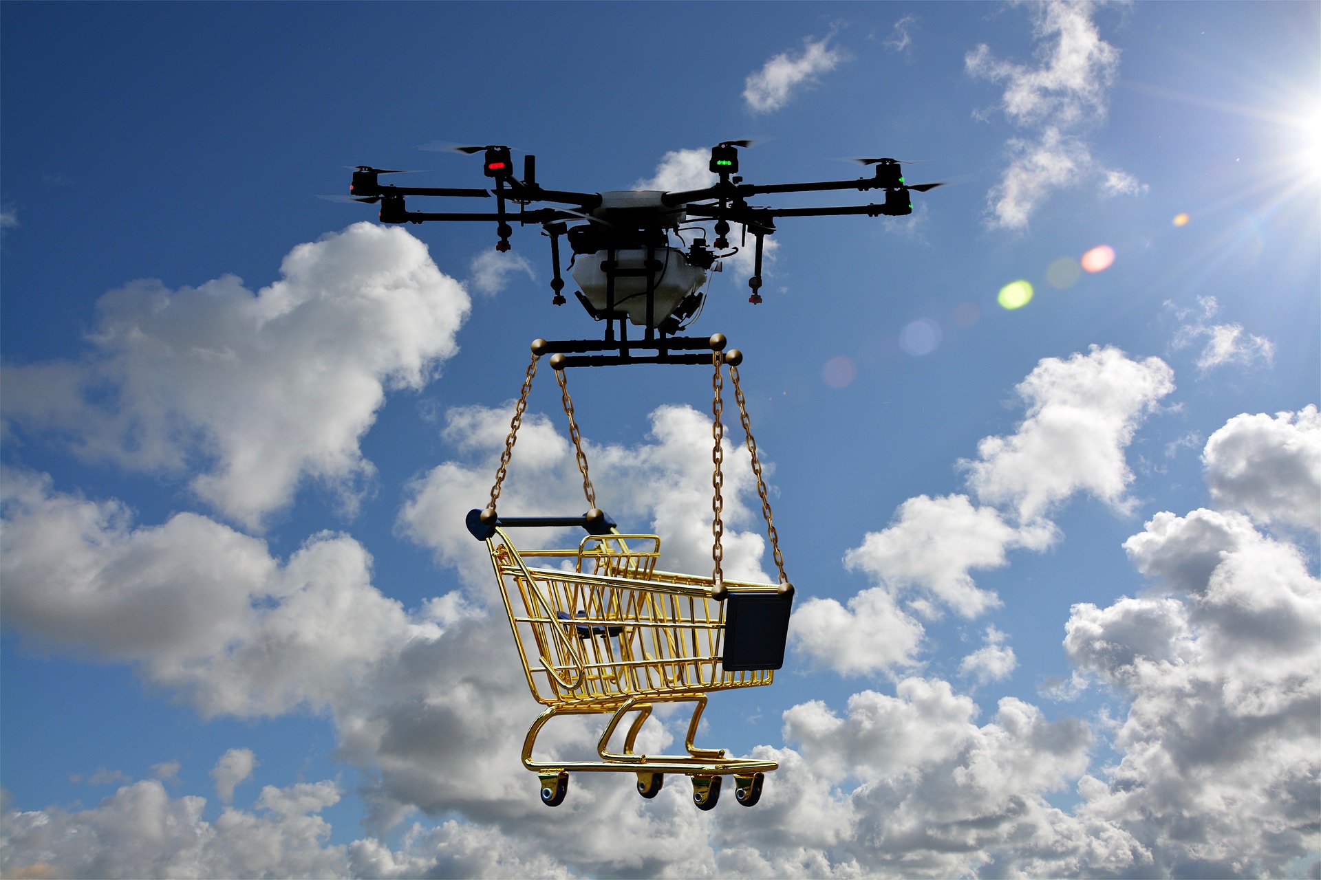 a drone holding a shopping cart on air.